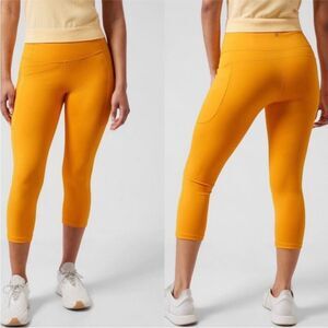 NWOT Athleta Ultimate Stash II Pocket Capri Legging Yellow-Orange Medium 8-10